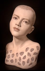 Sculpture of neutral tone bust. Giesston, acrylic paints.